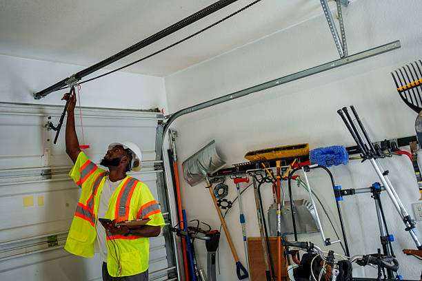 Professional Garage Door Panel Replacement technician working in St. Clair, PA